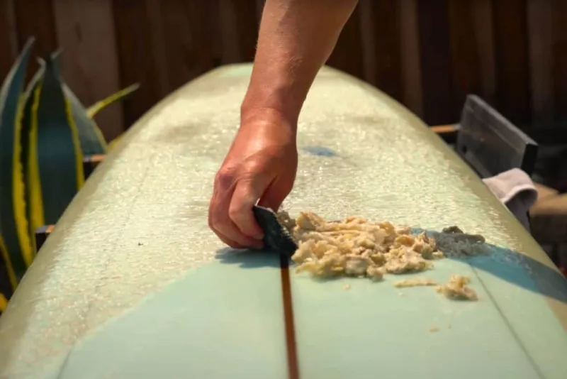 The Gunk Beneath Your Feet: What Wax Buildup Is Actually Doing to Your Board