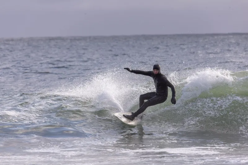 Bare Skin, Big Waves: The Young Surfers Charging Winter Swells With Less Gear Than Ever